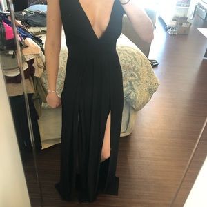 Full length black gown.
